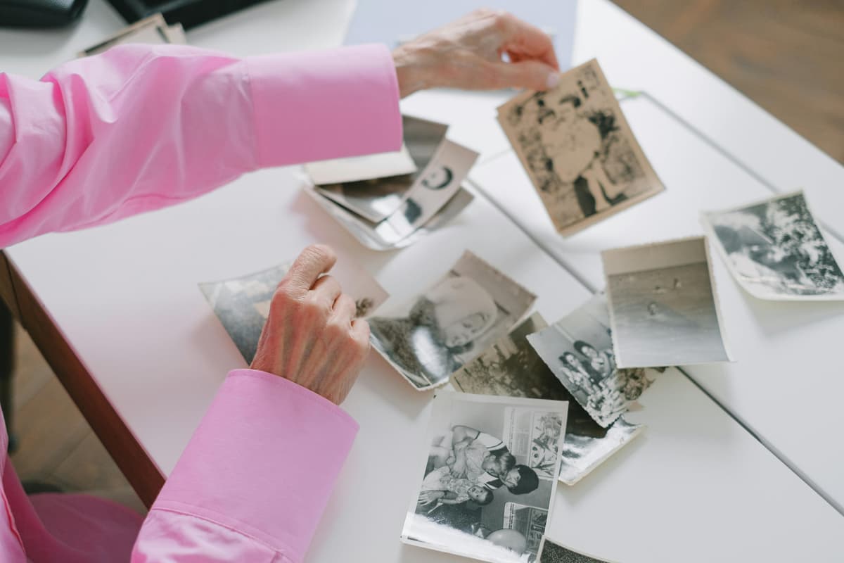 A family looking through old photographs
